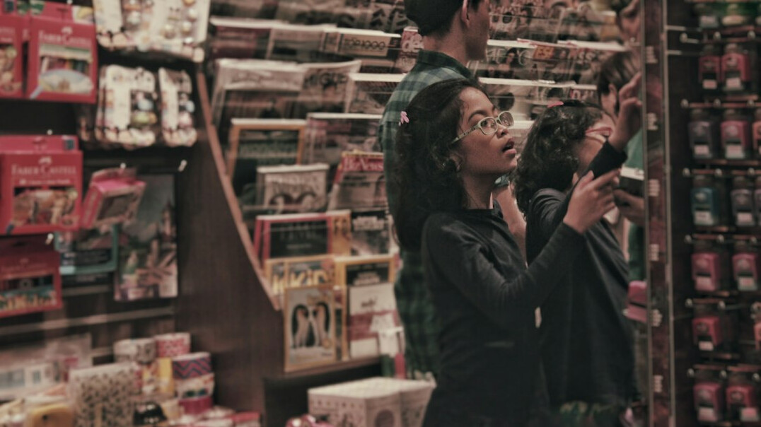 store detective observing shopper