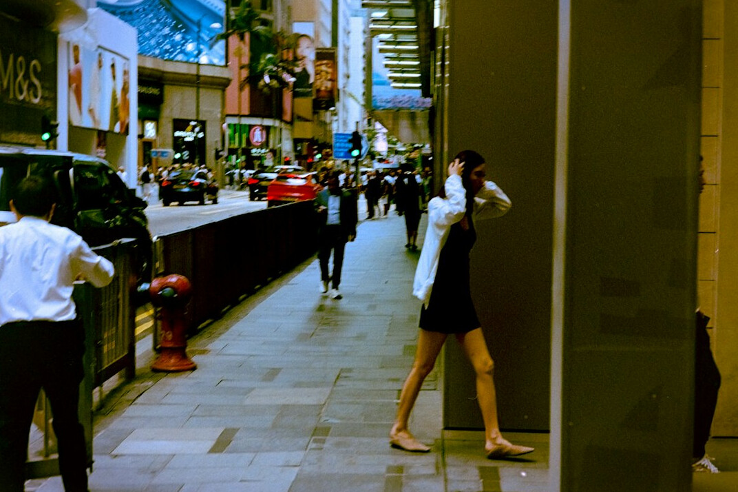 store detective observing shoppers